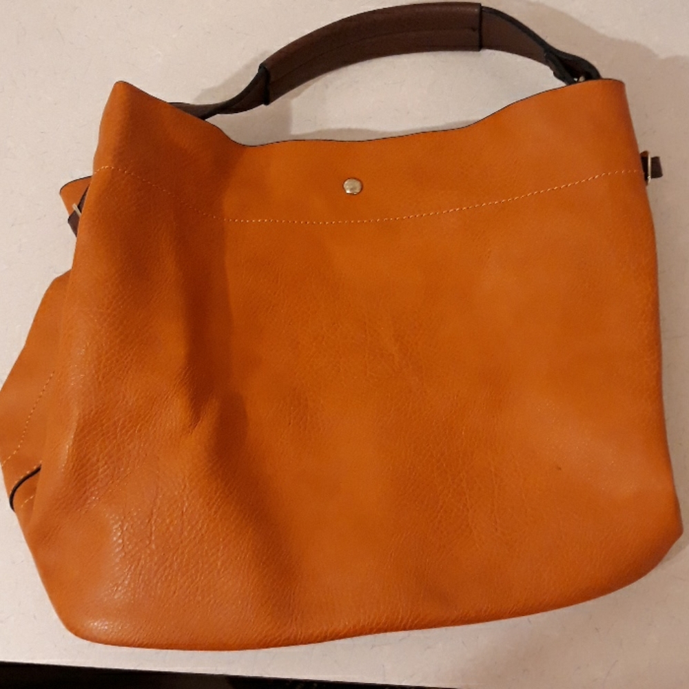 Burnt orange and brown purse
